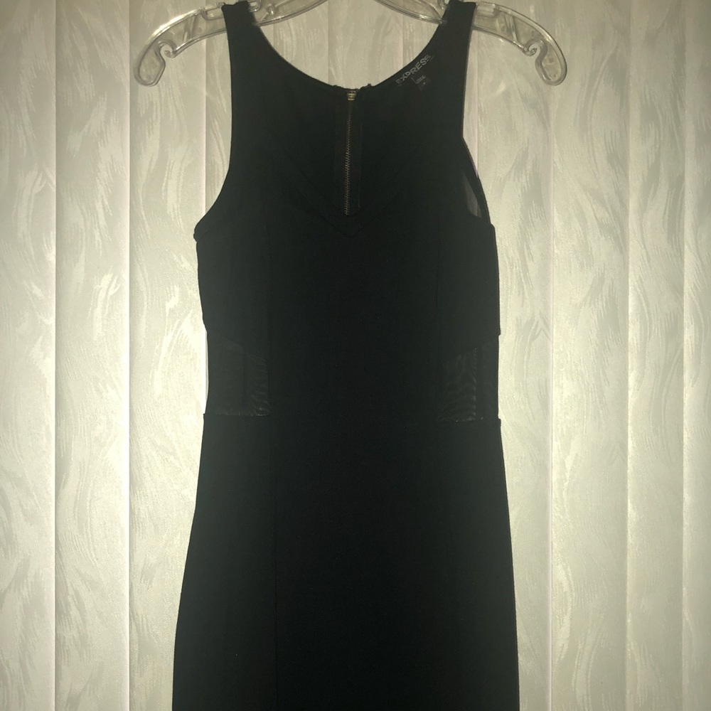 Express black dress with sheer accents.
